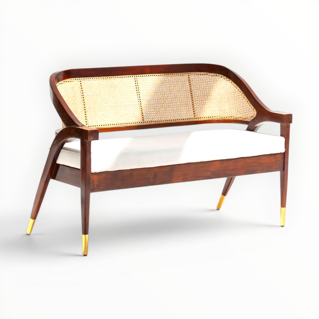 Wooden bench with wicker backrest on a white background
