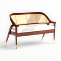 Wooden bench with wicker backrest on a white background