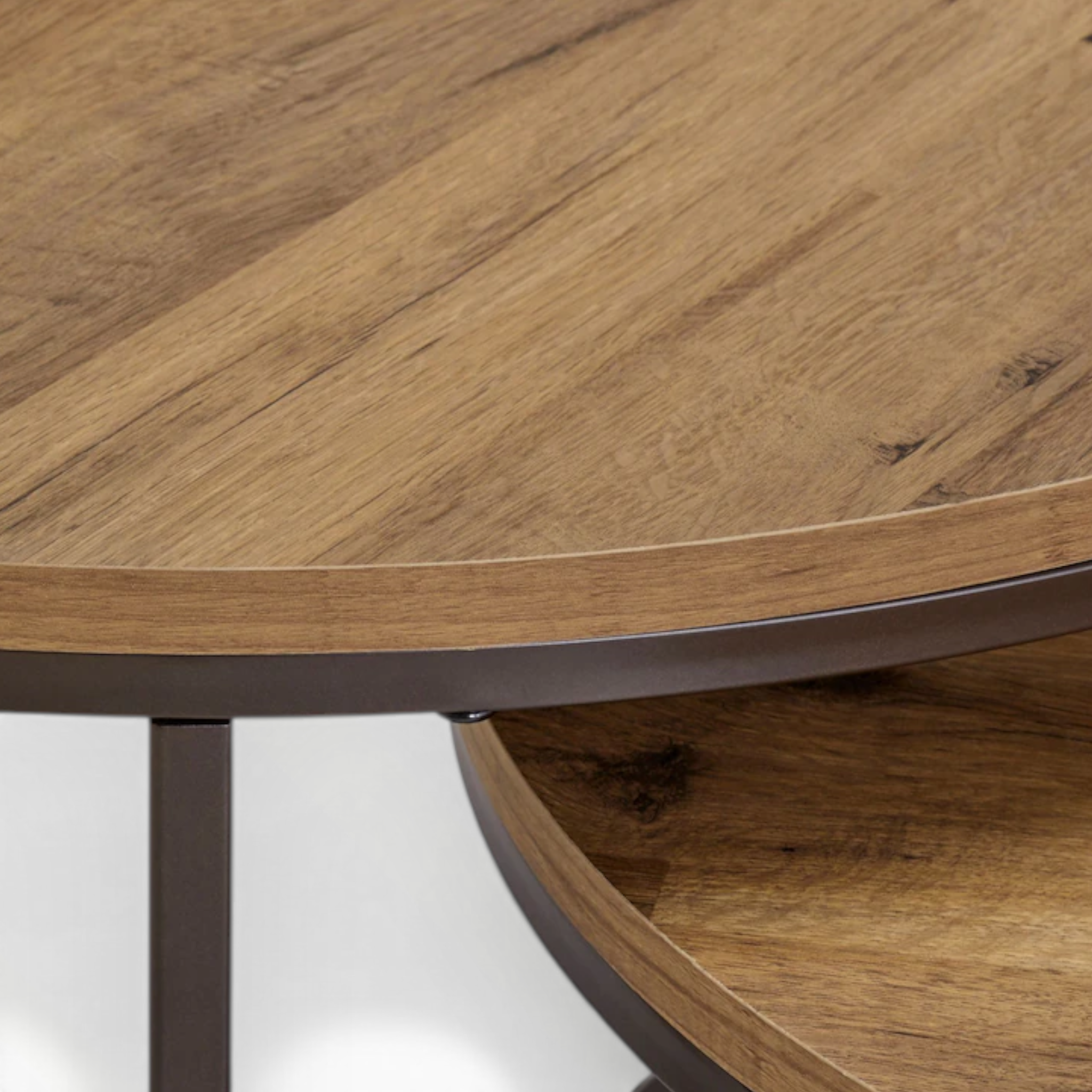 Close-up of a wooden table with a metal base on a white background