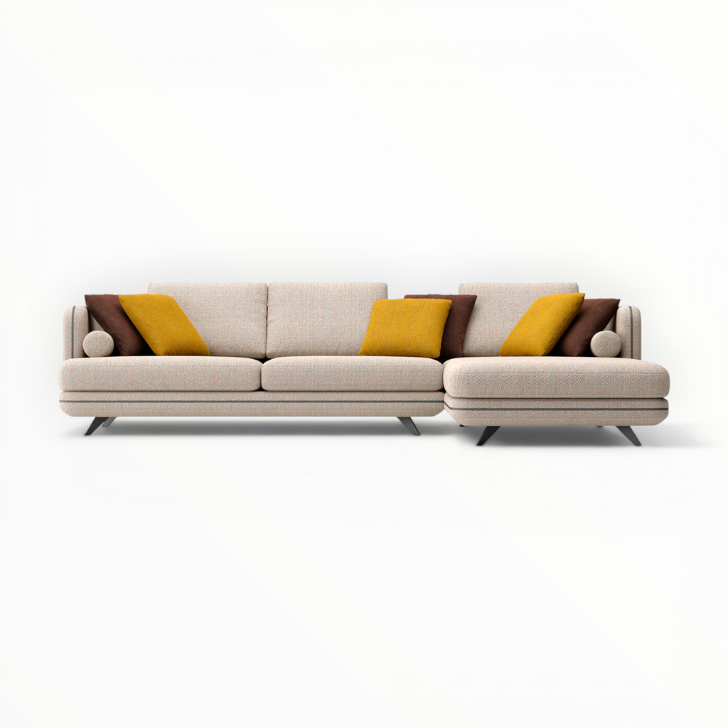 Beige sectional sofa with brown and yellow cushions on a white background