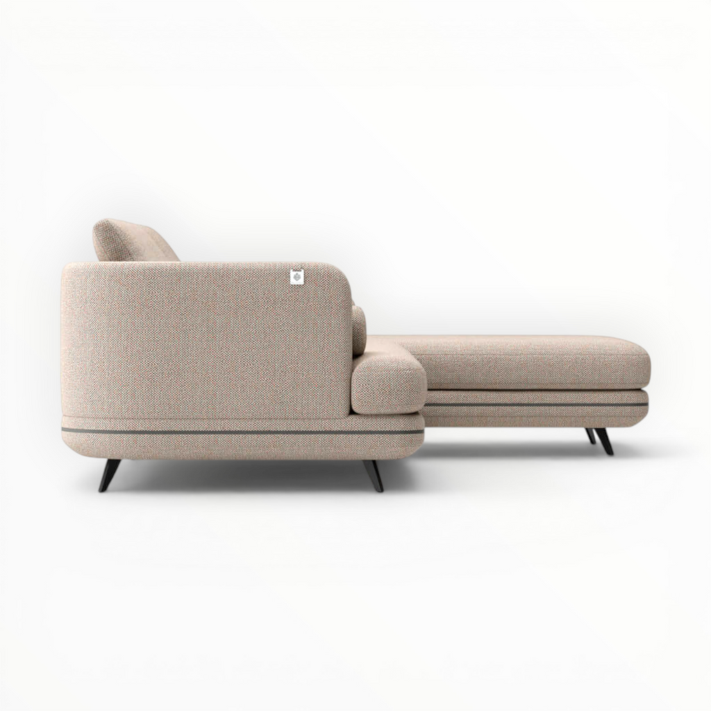 Beige sectional sofa with ottoman on a white background