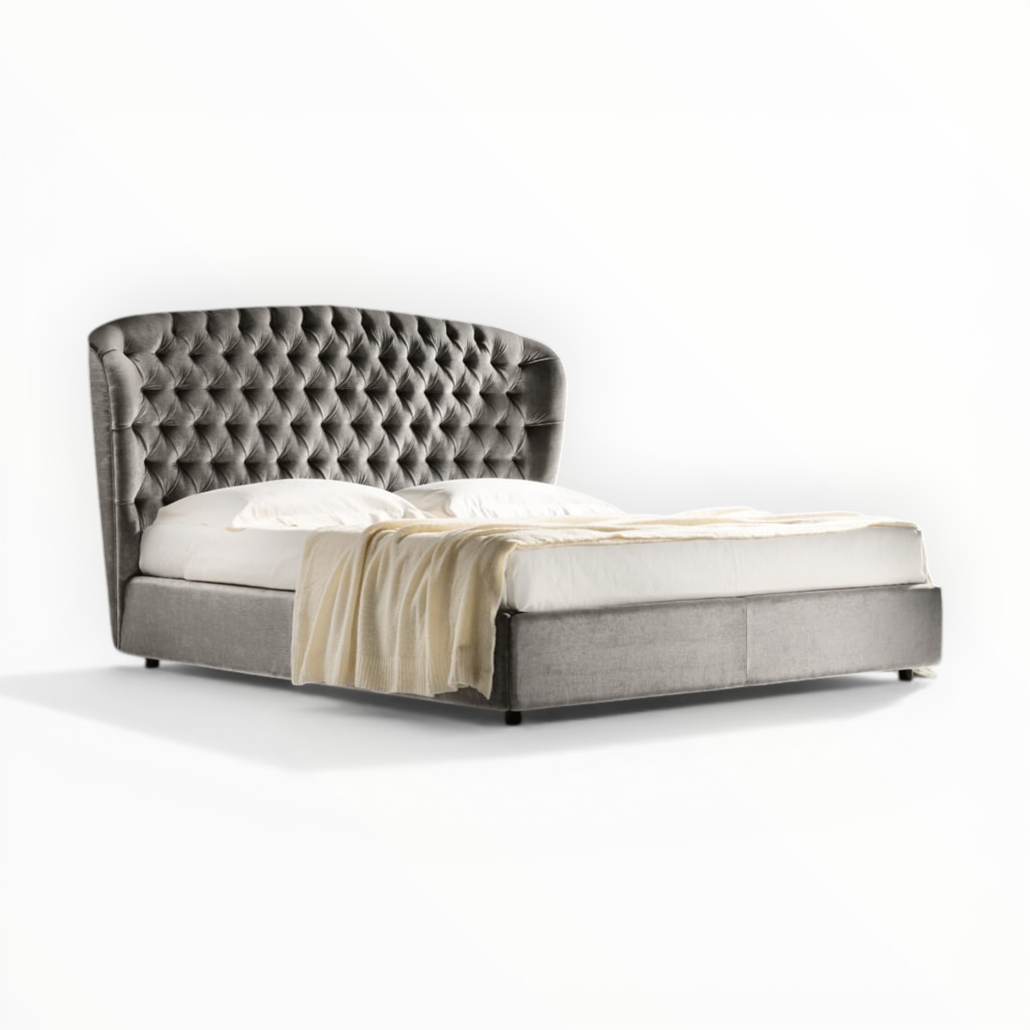 Gray upholstered bed with tufted headboard on a white background