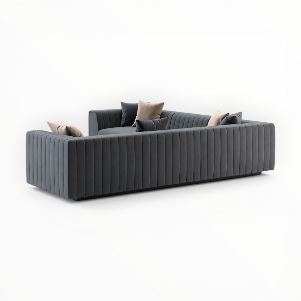 Gray sofa with decorative cushions on a white background