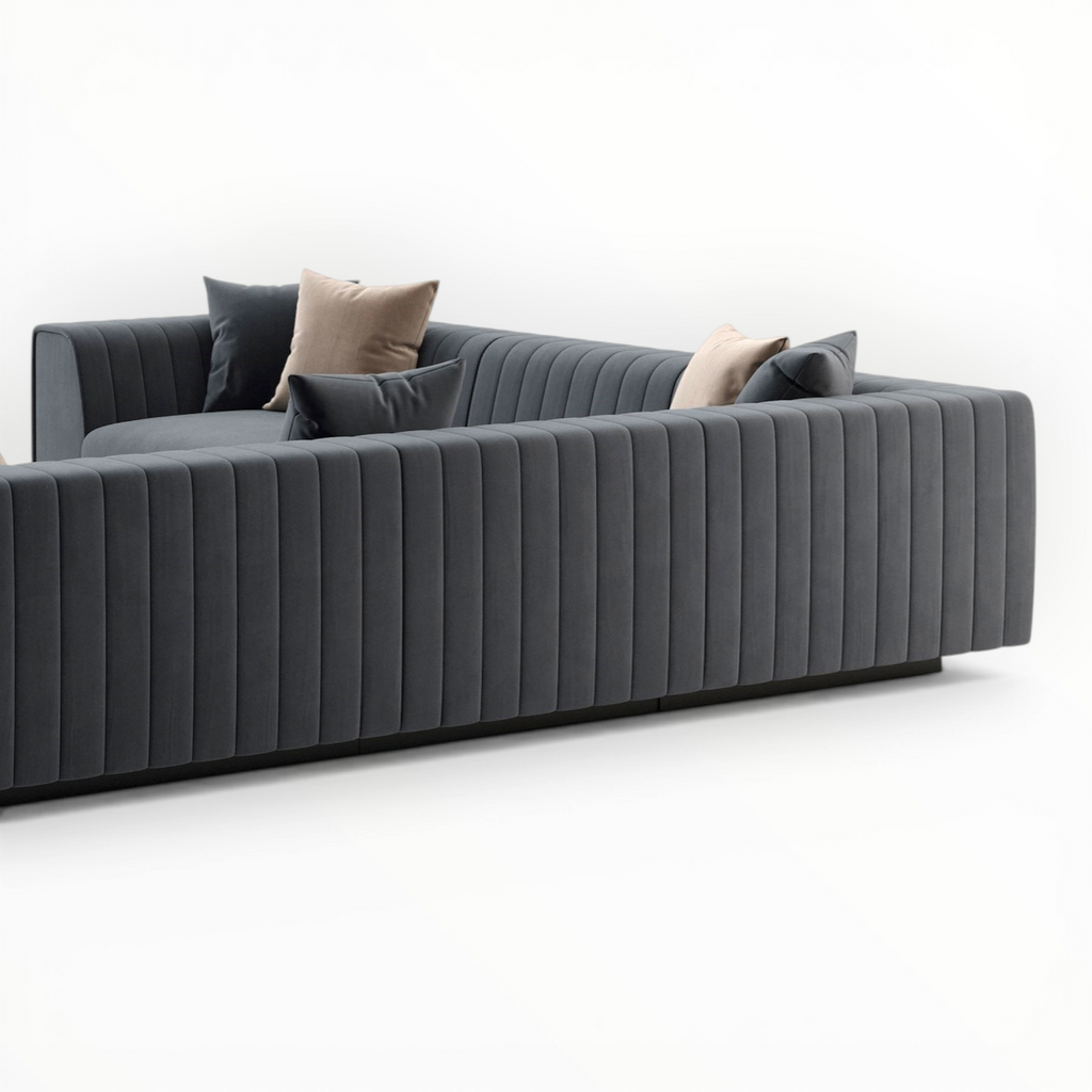 Gray sofa with decorative pillows on a white background