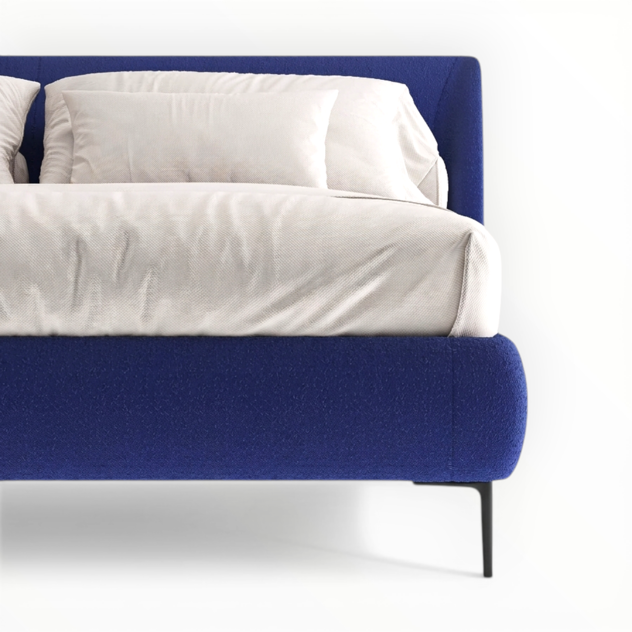 Blue bed frame with white bedding on a white background