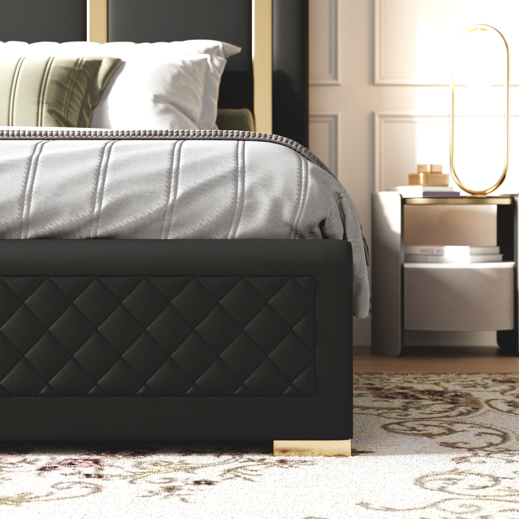 Black quilted bed frame with white bedding in a bedroom setting.