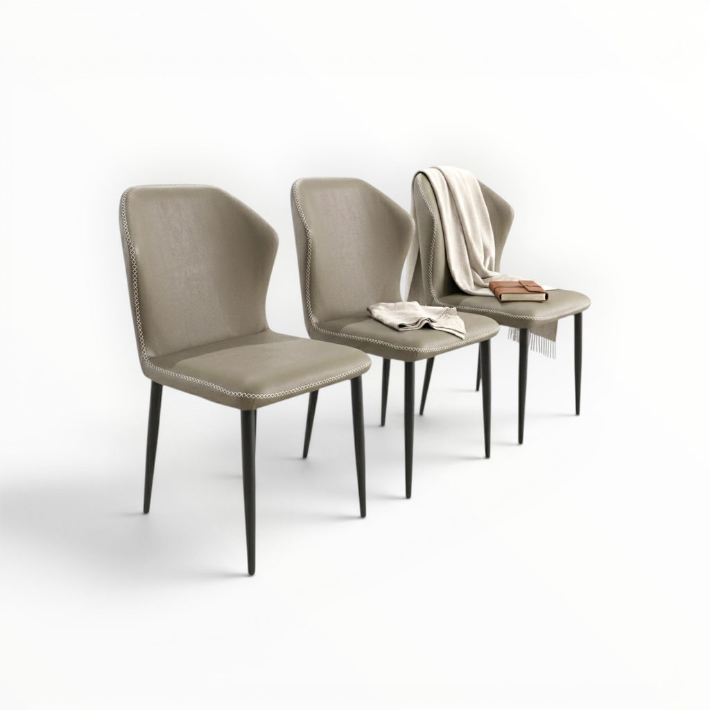 Urban dining chair – taupe leatherette wingback with cross-stitch trim and black metal legs