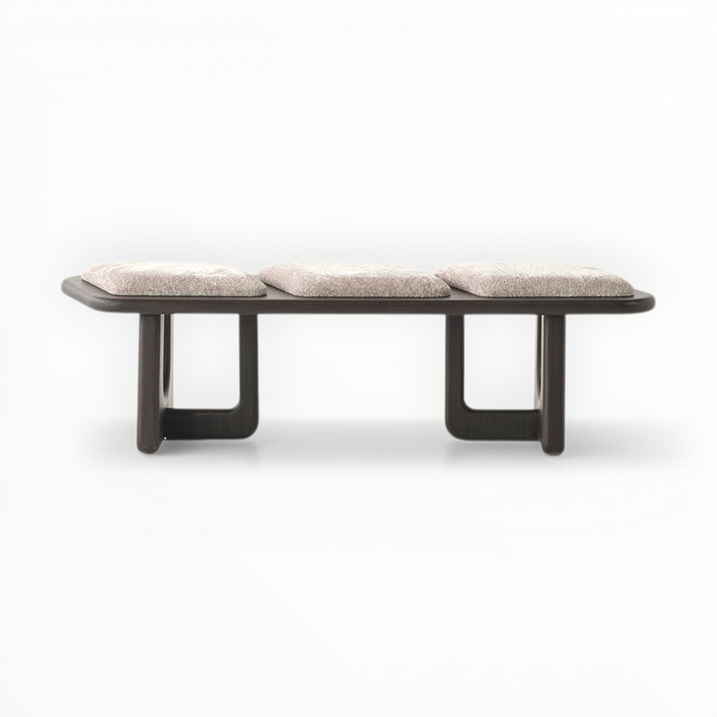 Modern bench with three cushioned seats on a white background