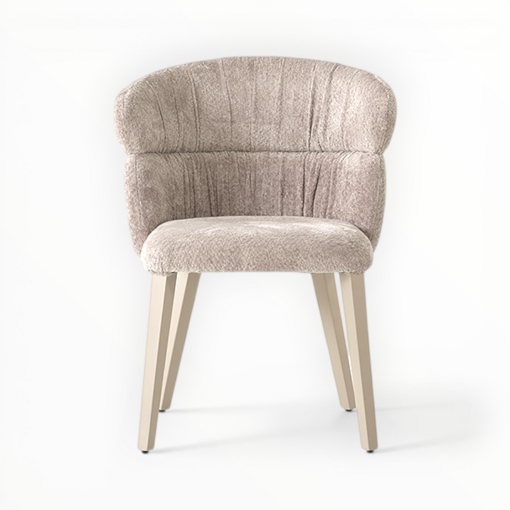 Beige upholstered chair with wooden legs on a white background
