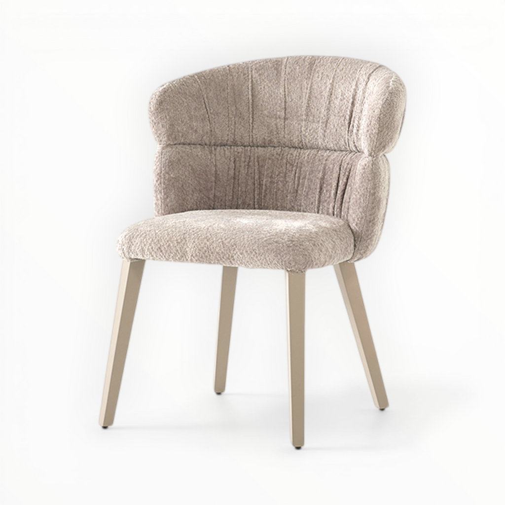 Beige upholstered chair with wooden legs on a white background