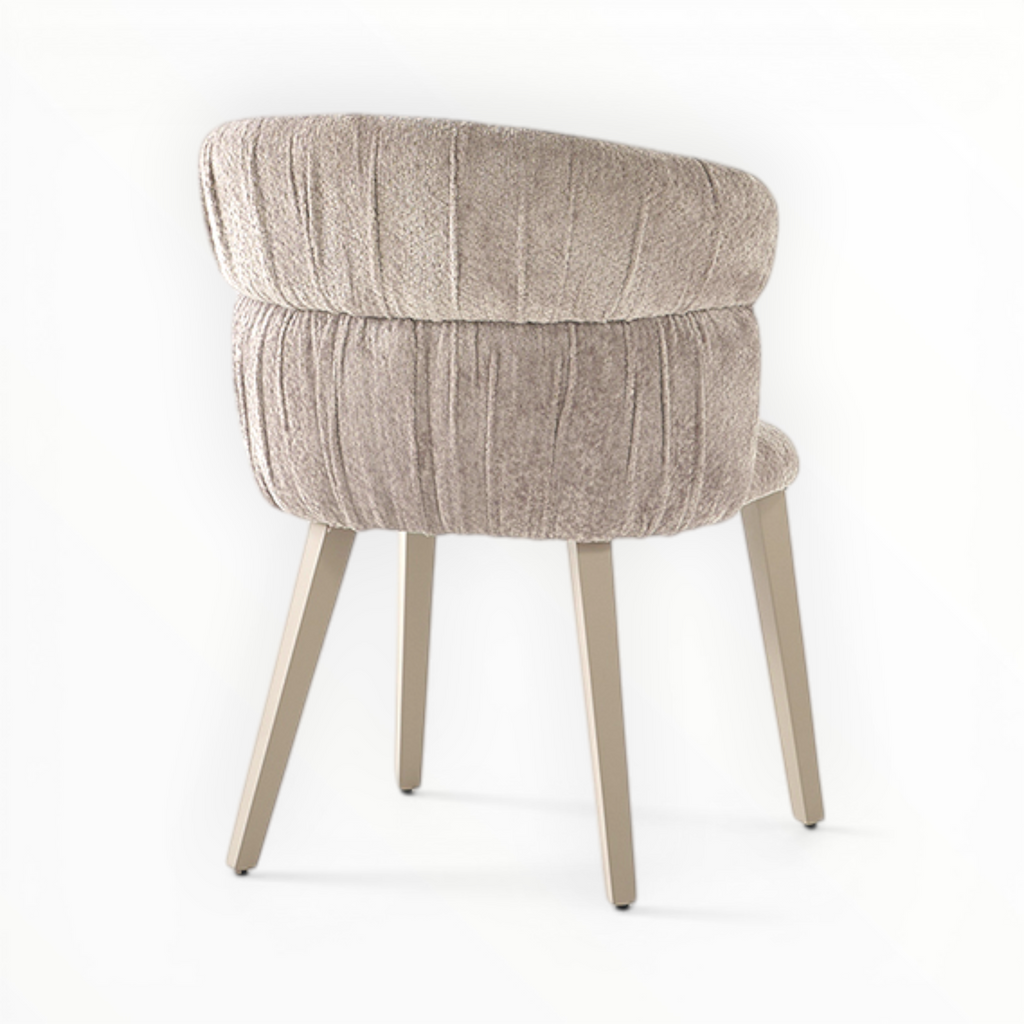 Beige upholstered chair with wooden legs on a white background