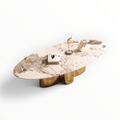 Verona oval faux marble coffee table top view with gold cylinder cluster base styled with books and figurine – Woodkraft Studio Hyderabad