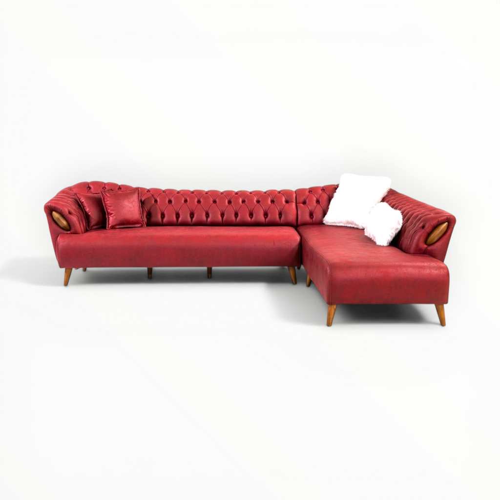 Red sectional sofa on a white background