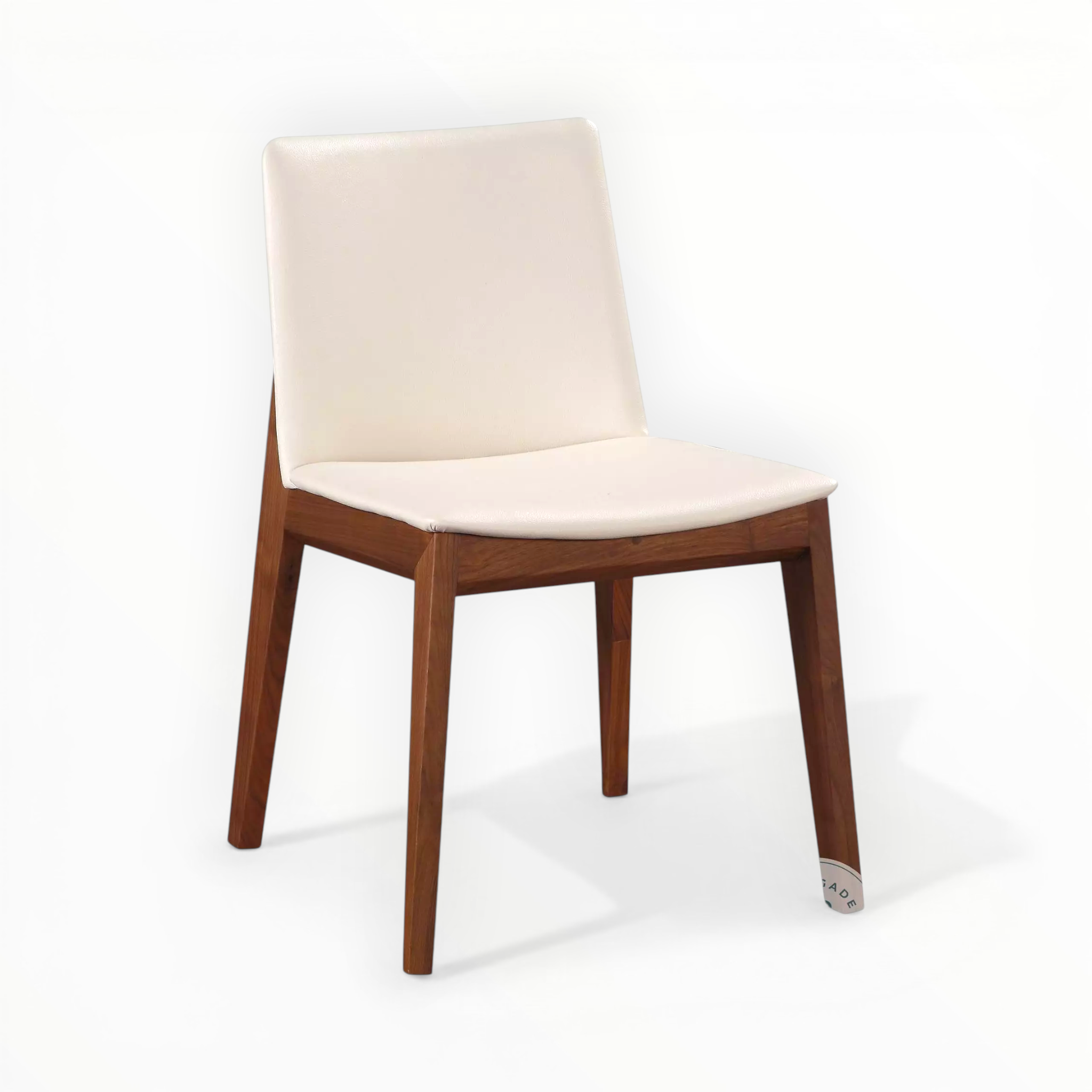 Chair with white seat and backrest on a wooden frame against a white background