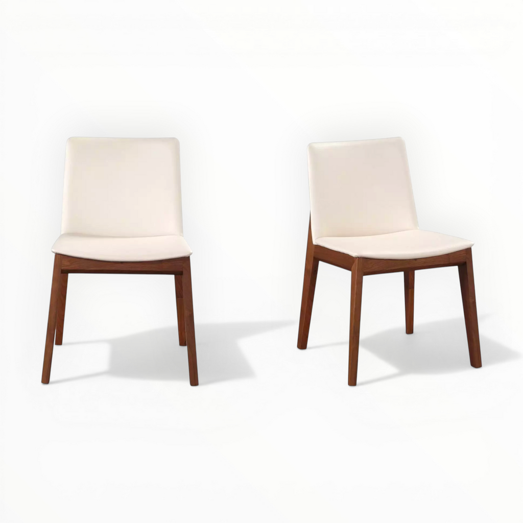 Two wooden chairs with white cushioned seats on a white background