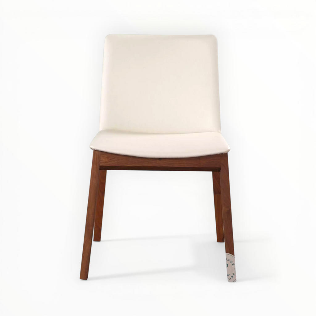 Chair with white cushioned seat and wooden legs on a white background