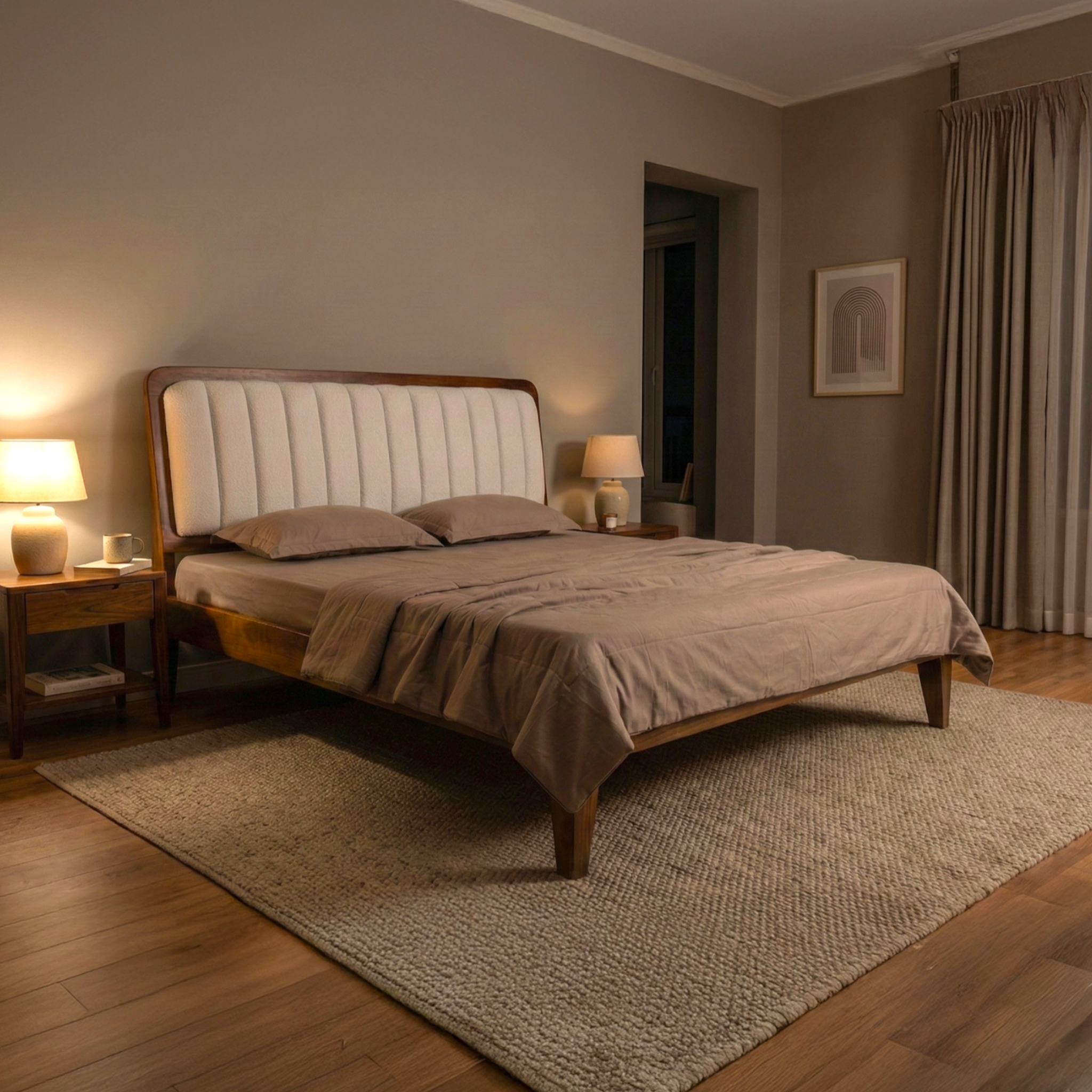 Bedroom with wooden bed, beige bedding, and lamps on nightstands.