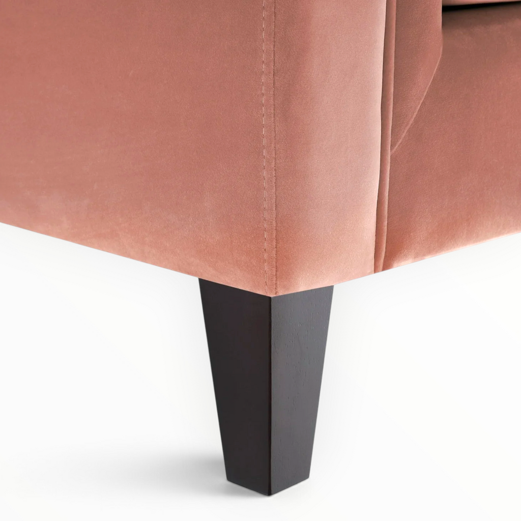 Blush Velvet Sofa – Front View Showing Full Button-Tufted Backrest and Bolster Cushions