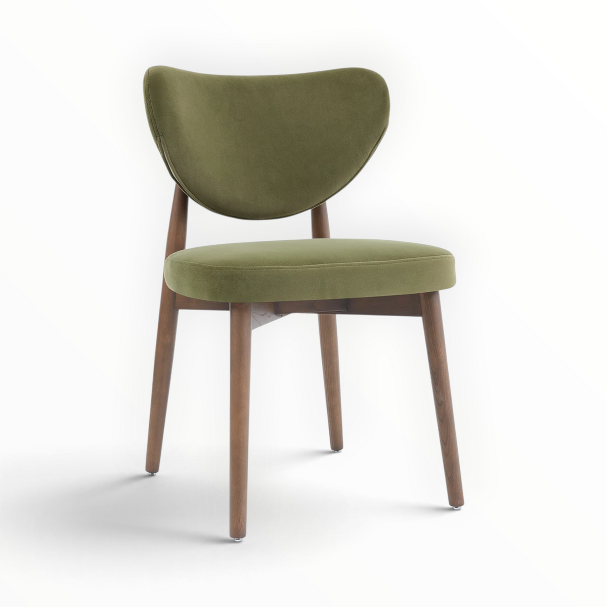 Emerald dining chair close-up – curved floating backrest with olive green velvet upholstery