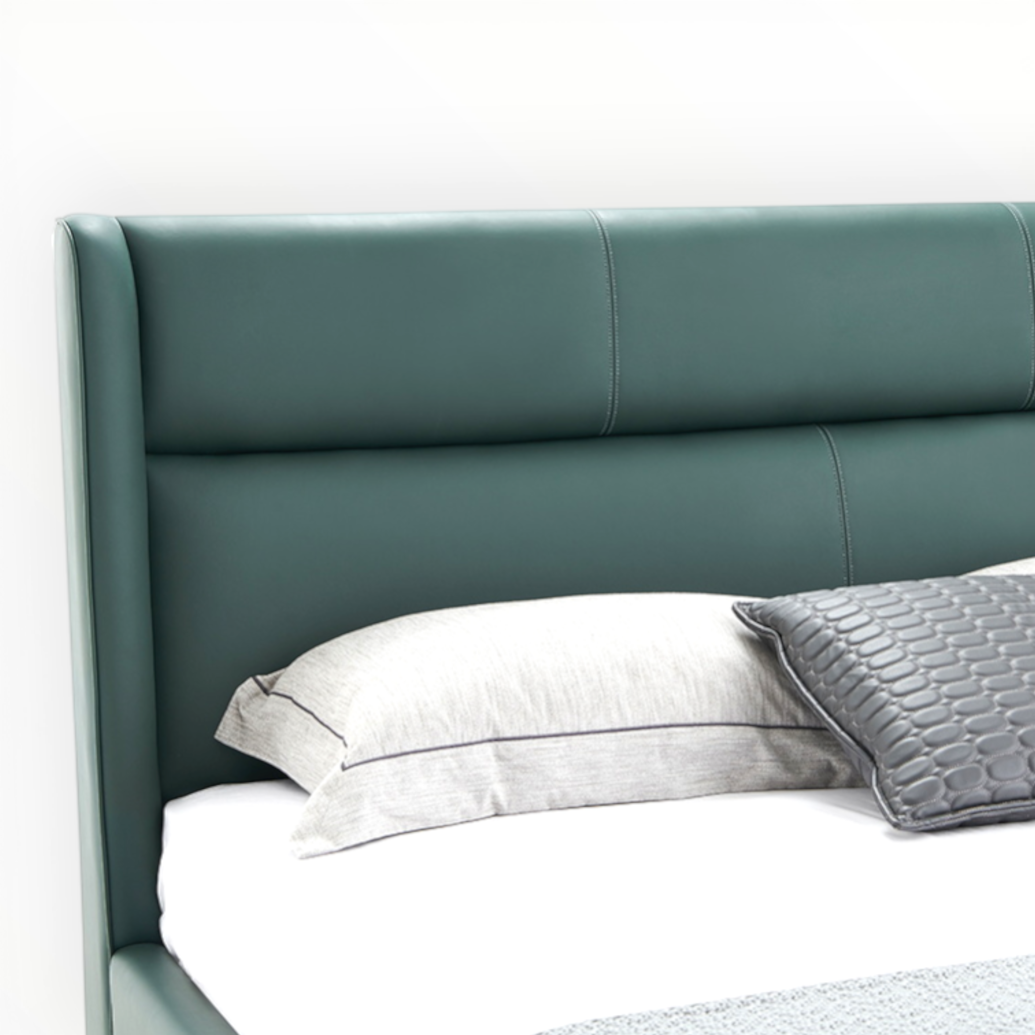 Teal bed with white bedding and gray pillow on a white background