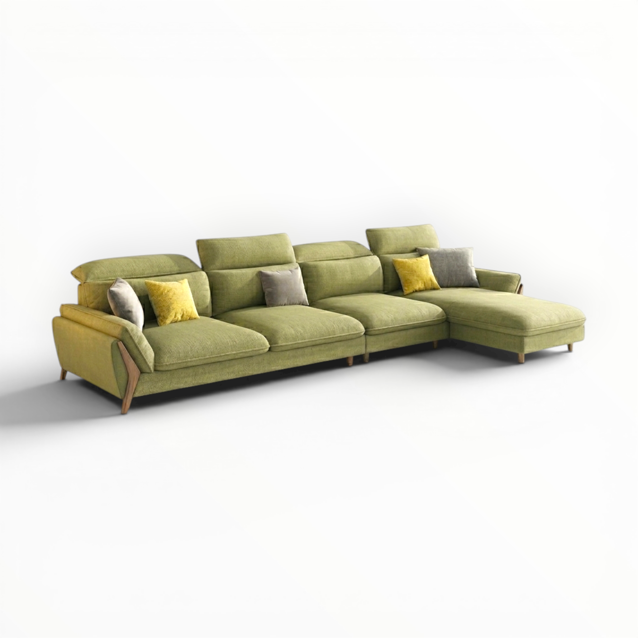 Green sectional sofa with colorful cushions on a white background